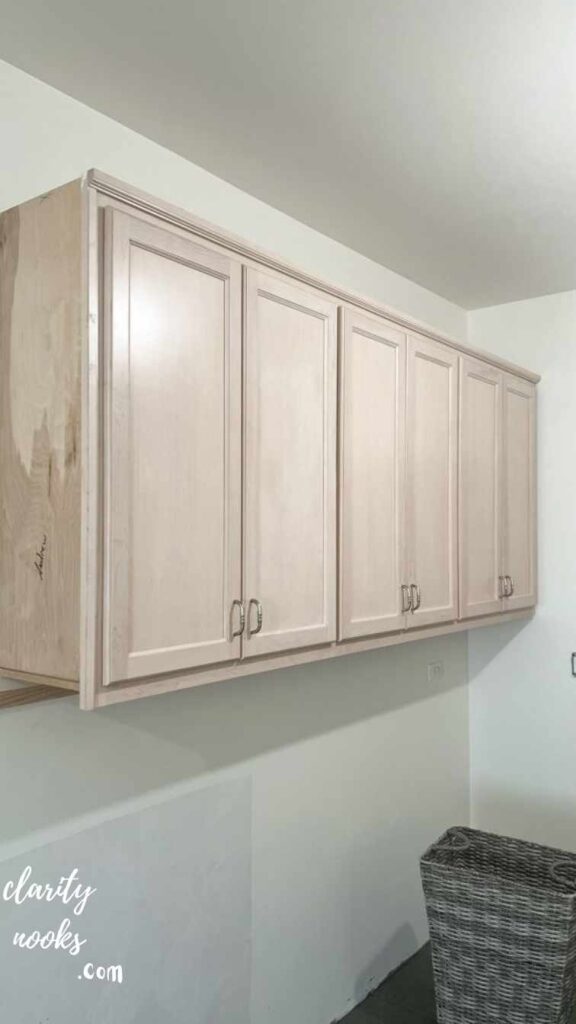 Swap Upper Cabinet Doors for Open Shelving to Reduce Visual Weight